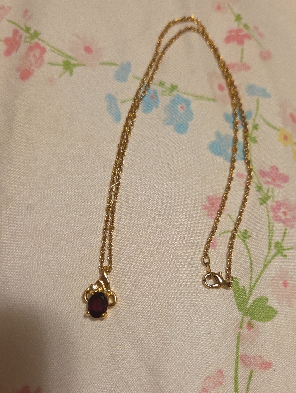 Gold Necklace with Deep Red Gemstone Pendant